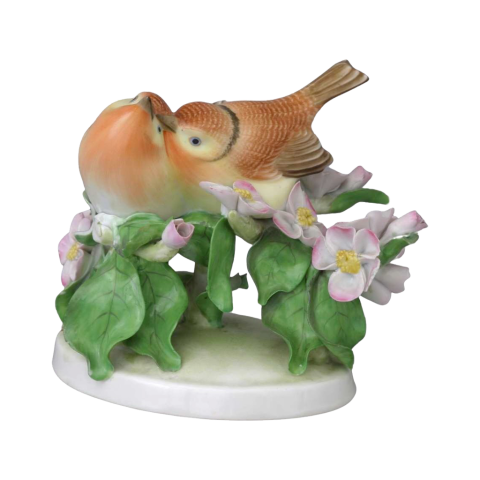 Pair of little birds on a twig