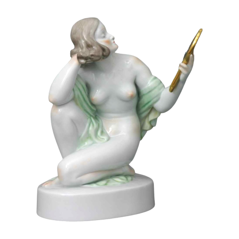 Nude woman with mirror